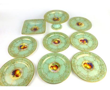 Richard Sebright (1870-1959) for Royal Worcester, retailed by Aspreys, a set of seven cabinet plates, the central roundel dec