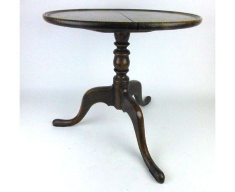 An 18th century oak dish top tripod table with turned column and three splay legs, h. 52 cm, dia, 51 cm CONDITION REPORT: Col