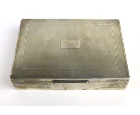 A silver hall marked engine turned cigarette box, Birmingham 1954, dia. 16.5  x 11.5  x 3.5 cm