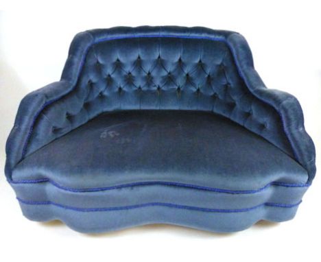 A Victorian settee upholstered in a blue draylon button backed fabric with shaped arms over a serpentine seat. h. 88 cm, w. 1