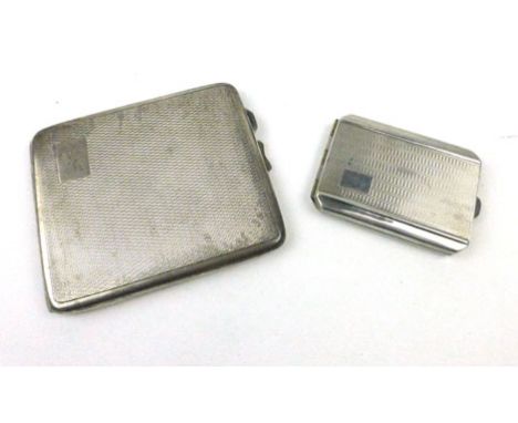 A silver hallmarked engine turned cigarette case, together with a silver hallmarked engine turned vesta case of various dates