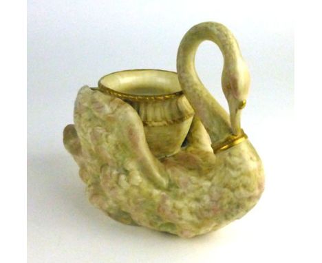 A Royal Worcester blush ivory planter modelled as a swan, numbered 532, p.d.c.m. 1902, h. 21 cm