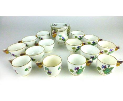 A 19th century Mintons part tea and coffee service, the handles in the form of butterflies, numbered 65701 CONDITION REPORT: 