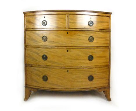 An early 19th century mahogany bow fronted chest of two short over three graduated drawers on shaped bracket feet. h. 107 cm,