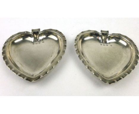 A pair of silver hallmarked heart shaped trinket dishes, Birmingham 1907 marked A & J Zimmerman Limited in fitted case, appro