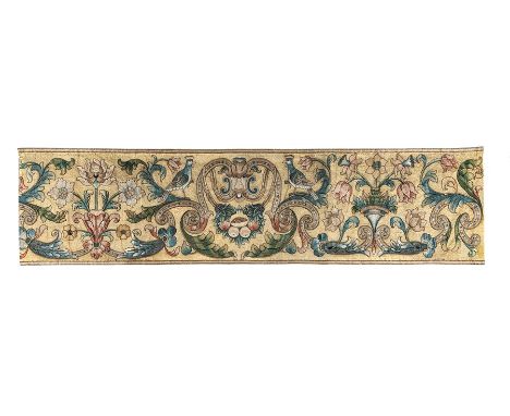 An early 18th century frieze panel 
Of linen embroidered with coloured silks in laid and applied stitches, designed with a ma