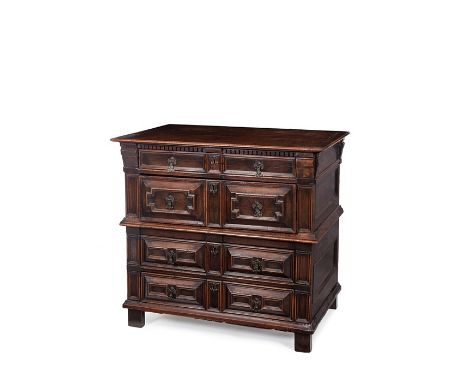 A Charles II cedar, cherrywood and snakewood four-drawer chest, circa 1670
With cleated top and dentil-moulded frieze above t