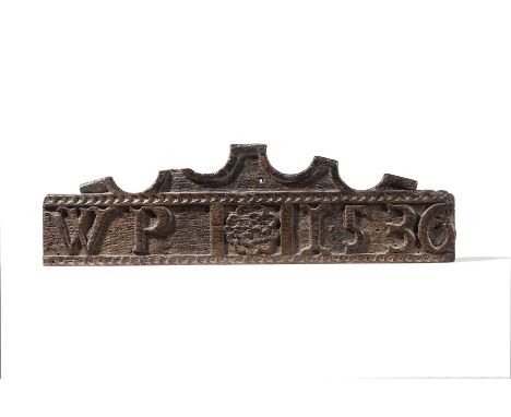 A carved panel or crest, initialled and dated WP 1536
44cm wide x 13cm high.
