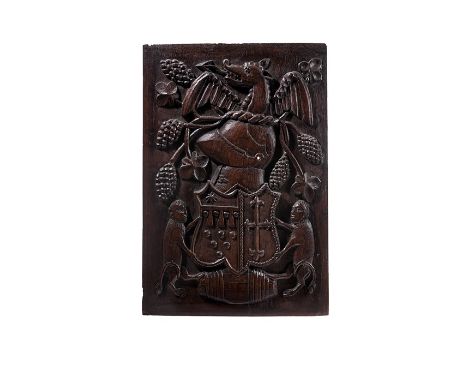 A large English heraldic panel, late 16th or early 17th century
Depicting an armorial cartouche held by monkeys, each with on