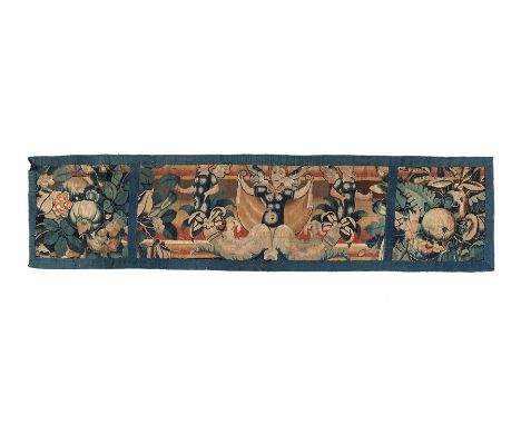 A 17th century tapestry panel
The centre designed with three angels, displays of fruit to each side woven in shades of blue, 