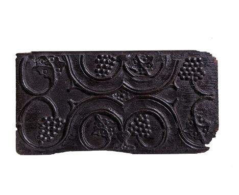 A&nbsp; parchemin type panel, enriched with grape clusters, 16th century
53cm x 27cm, together with a leafy tendril boss carv