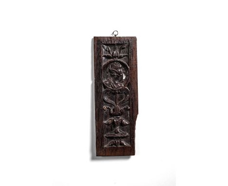 An English portrait medallion panel, circa 1530
30cm x 10cm, together with a 16th century panel carved with a hippocampus, 31