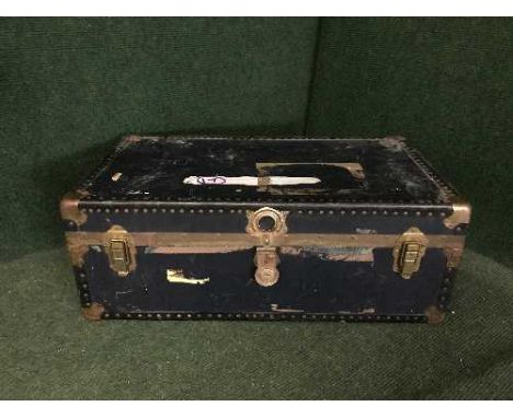 A metal bound travelling trunk 