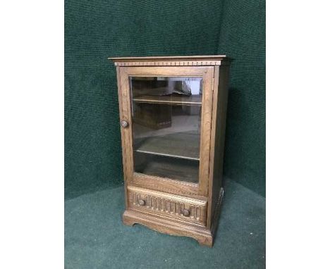 An Ercol audio cabinet 