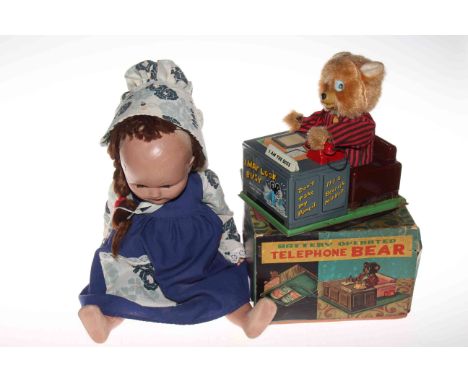 Vintage telephone bear in box and an old doll.