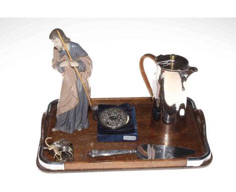 Silver plated hot water jug, three silver napkin rings, silver backed mirror, silver handled cake slice and Nao figure 'Josep
