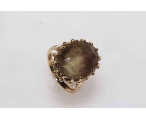 Smokey quartz 9 carat gold ring, size K.