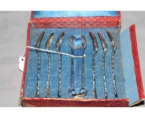 Boxed set of Chinese silver teaspoons and tongs.