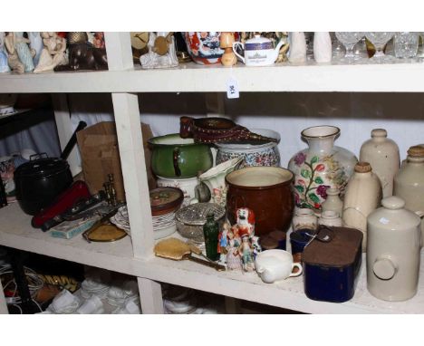 Stoneware bottles, planters, enamel tin, figurines, child's chair, trunk with contents.