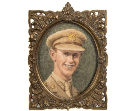 English School early 20th Century-
A miniature portrait of a WWI subaltern:-
head and shoulders
watercolour, 
oval, 8cm. 