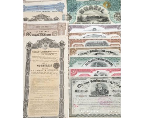 SCRIPHOLOGY : a collection of 15 highly decorative share certificates, various sizes and dates, a number pre-revolution Russi
