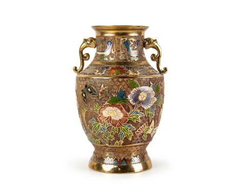 Chinese cloisonne jar with two decorative handles,  densely designed with scroll flower forms. H:10 3/4in(27.3cm) W:6 3/4in(1