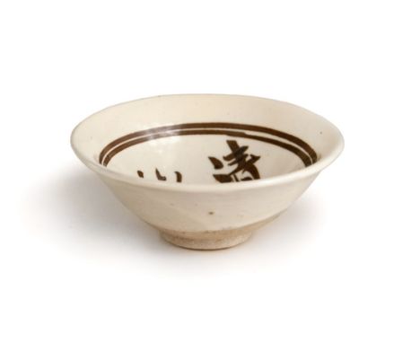 Cream glazed bowl freely incised with four large  characters “Qing Jing Dao De”, which means  peaceful and Daoism, on the int