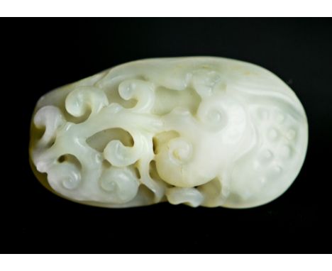 A carved double-sided lingzhi mushroom toggle -  jade Lingzhi mushrooms represent the will to have  all the good wishes of th