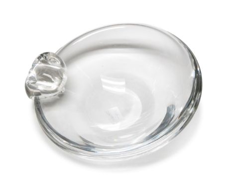 First introduced at the 1939 World's Fair, this  iconic bowl features the fluid scrolled glass bit  handle that characterizes