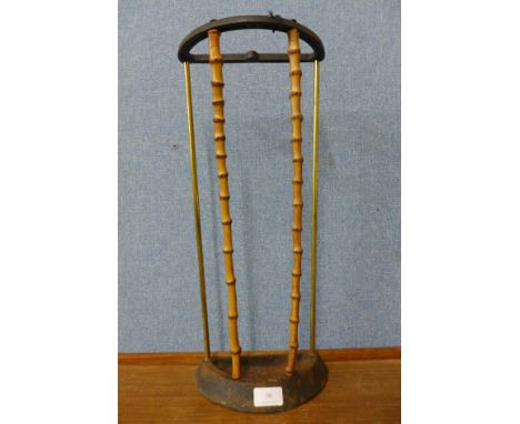 A Victorian bamboo and cast iron stick stand