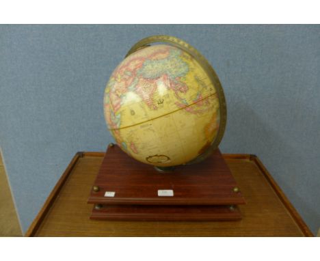 A terrestrial globe on stand