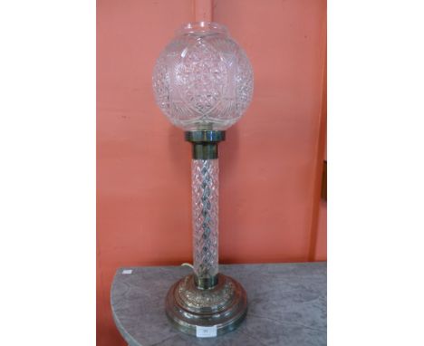 A silver plated and cut glass table lamp