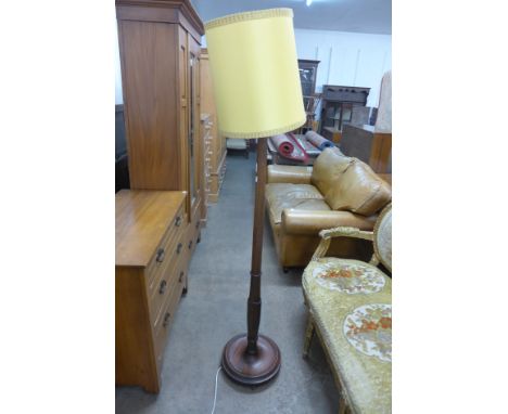 A mahogany standard lamp