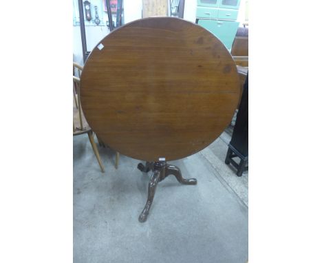 A George III mahogany circular tilt-top tripod table 