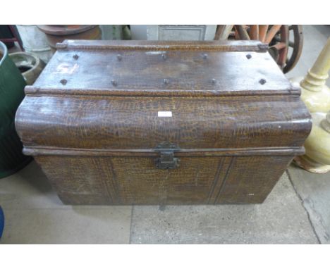 A tin steamer trunk