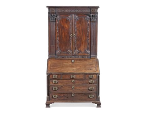 A George III carved mahogany and ormolu mounted bureau cabinet attributed to Gillowsthe carving probably by James TownsonCirc