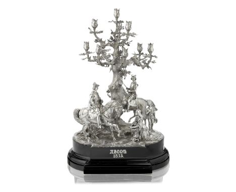 The 1873 Ascot 'Gold Cup': a Victorian silver centrepiece candelabrumRobert Garrard, London 1873 Modelled as the moment Eliza