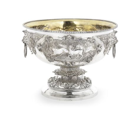 A large Victorian silver racing trophy bowlJames Barclay Hennell, London 1879 The body with two cast equine scenes and two dr