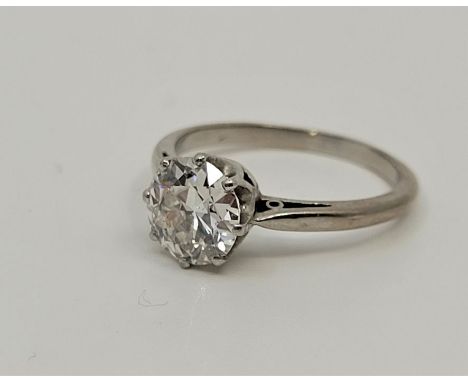 A precious white metal diamond solitaire ring, set round brilliant cut diamond (stone approx. 8mm diameter x 4mm deep, EDW 1.