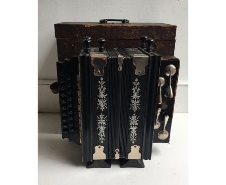 A vintage accordion, boxed.&nbsp;