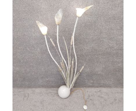 A mid-century steel floor lamp of naturalistic reed and bullrush form on a heavy spherical base, with Murano style handblown 