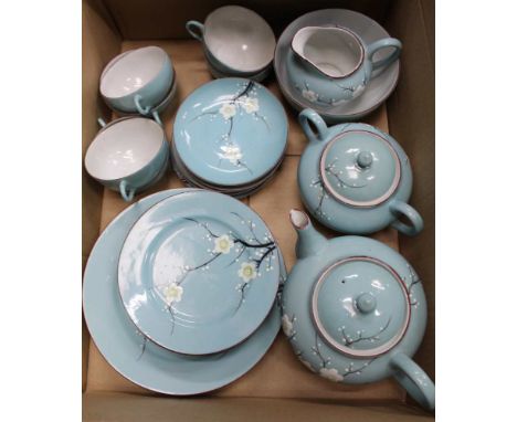 A BOX CONTAINING A JAPANESE PART TEA SERVICE depicting spring blossom, on a turquoise ground 