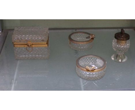 A FOUR PIECE GLASS &amp; GILDED METAL SMOKING SET, comprising cigarette box, twin ashtrays &amp; a table lighter 