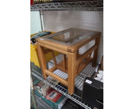 A MODERN LIGHT OAK RECTANGULAR TOPPED MAGAZINE TABLE with insert glass panel 