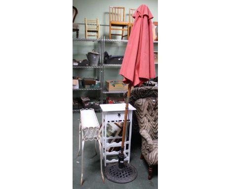 A LATER PAINTED FREESTANDING WINE RACK, with glass hangers and storage drawer, together with a garden planter on stand and me