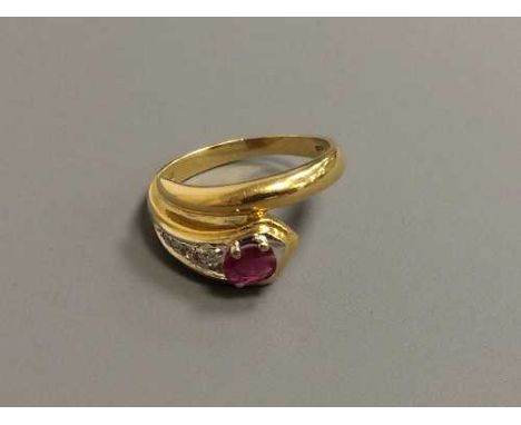 An 18ct gold ruby and diamond snake ring, 4.7g