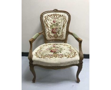 A continental armchair in tapestry covering 