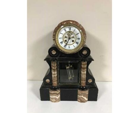 A Victorian two tone French marble mantle clock with open escapement and mercury pendulum 