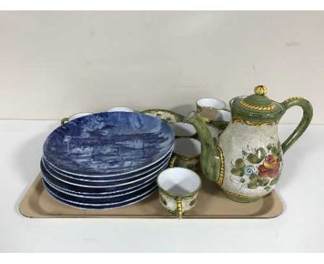 A tray containing a thirteen-piece pottery tea service together with a set of seven West German blue and white wall plates