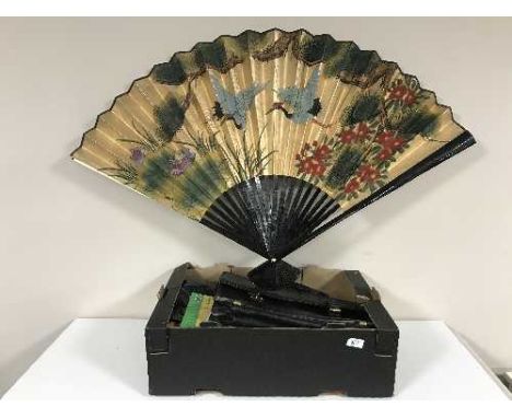 A box of leather briefcase, hand painted fan, child's mannequin, Now TV box etc 